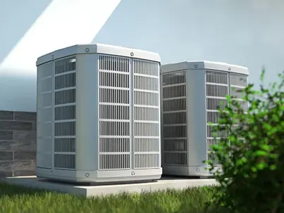Two modern, light-colored outdoor air conditioning units