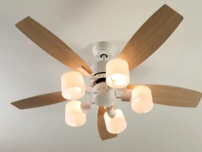 A modern white ceiling fan